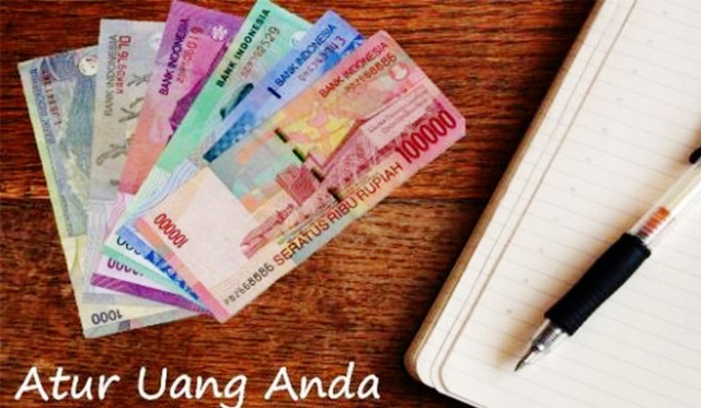mengatur uang